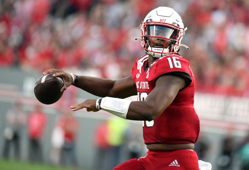 Nov 12, 2022; Raleigh, North Carolina, USA; North Carolina State Wolfpack quarterback MJ Morris (16) throws a pass during the first half against the Boston College Eagles at Carter-Finley Stadium. Mandatory Credit: Rob Kinnan-USA TODAY Sports