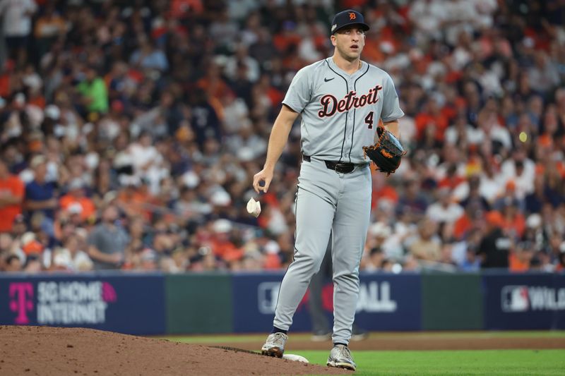 Oct 2, 2024; Houston, Texas, USA; Detroit Tigers pitcher Beau Brieske (4) drops the rosin bag before throwing against the Houston Astros during the fifth inning of game two of the Wildcard round for the 2024 MLB Playoffs at Minute Maid Park. Mandatory Credit: Thomas Shea-Imagn Images