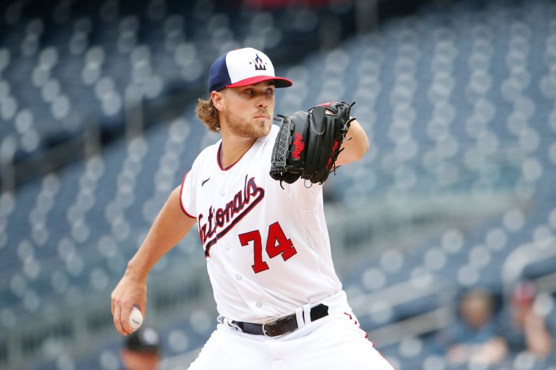 Jun 22, 2023; Washington, District of Columbia, USA; Washington Nationals starting pitcher Jake Irvin (74) throws the ball during the first inning against the Arizona Diamondbacks at Nationals Park. Mandatory Credit: Amber Searls-USA TODAY Sports