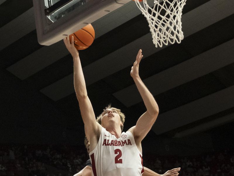 Nov 17, 2023; Tuscaloosa, Alabama, USA;  Alabama forward Grant Nelson (2) goes to the hoop against Mercer at Coleman Coliseum. Mandatory Credit: Gary Cosby Jr.-USA TODAY Sports