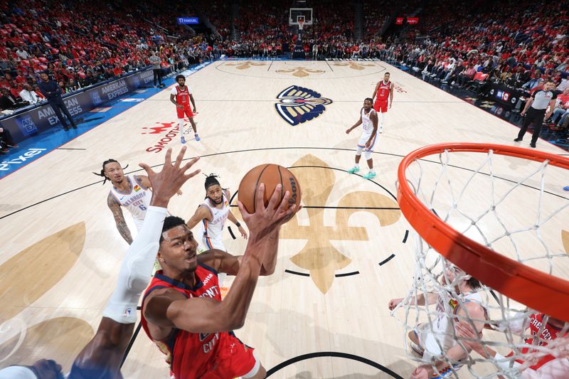 NEW ORLEANS, LA - APRIL 27: Trey Murphy III #25 of the New Orleans Pelicans drives to the basket during the game against the Oklahoma City Thunder during Round 1 Game 3 of the 2024 NBA Playoffs on April 27, 2024 at the Smoothie King Center in New Orleans, Louisiana. NOTE TO USER: User expressly acknowledges and agrees that, by downloading and or using this Photograph, user is consenting to the terms and conditions of the Getty Images License Agreement. Mandatory Copyright Notice: Copyright 2024 NBAE (Photo by Jeff Haynes/NBAE via Getty Images)