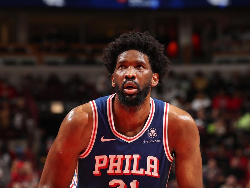 CHICAGO, IL - DECEMBER 8: Joel Embiid #21 of the Philadelphia 76ers shoots a free throw during the game against the Chicago Bulls on December 8, 2024 at United Center in Chicago, Illinois. NOTE TO USER: User expressly acknowledges and agrees that, by downloading and or using this photograph, User is consenting to the terms and conditions of the Getty Images License Agreement. Mandatory Copyright Notice: Copyright 2024 NBAE (Photo by Gary Dineen/NBAE via Getty Images)