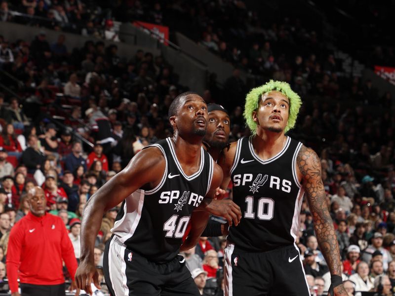 PORTLAND, OR - DECEMBER 13: Harrison Barnes #40 and Jeremy Sochan #10 of the San Antonio Spurs plays defense during the game against the Portland Trail Blazers on December 13, 2024 at the Moda Center Arena in Portland, Oregon. NOTE TO USER: User expressly acknowledges and agrees that, by downloading and or using this photograph, user is consenting to the terms and conditions of the Getty Images License Agreement. Mandatory Copyright Notice: Copyright 2024 NBAE (Photo by Cameron Browne/NBAE via Getty Images)