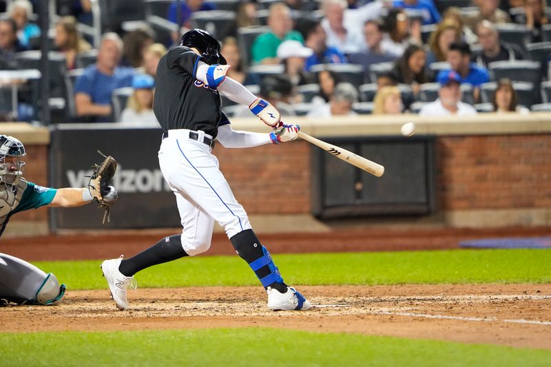 Sep 1, 2023; New York City, New York, USA; New York Mets center fielder Brandon Nimmo (9) hits a home run against the Seattle Mariners during the sixth inning at Citi Field. Mandatory Credit: Gregory Fisher-USA TODAY Sports