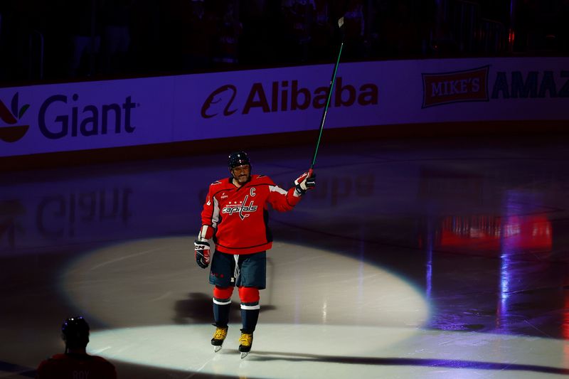 Oct 8, 2025; Washington, District of Columbia, USA; Washington Capitals left wing Alex Ovechkin (8) is introduced prior to the Capitals' game against the Boston Bruins at Capital One Arena. Mandatory Credit: Geoff Burke-Imagn Images