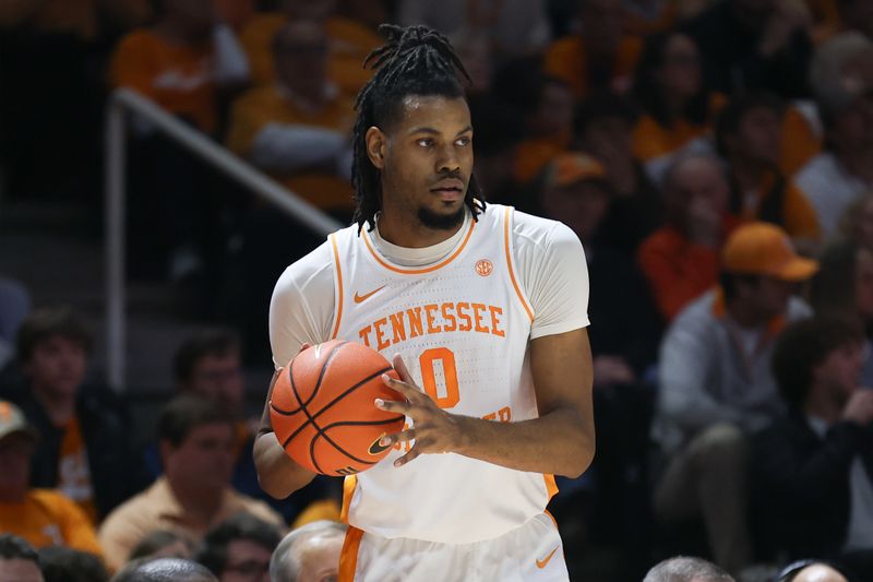 Jan 20, 2024; Knoxville, Tennessee, USA; Tennessee Volunteers forward Jonas Aidoo (0) looks to throw the ball inbounds against the Alabama Crimson Tide during the first half at Thompson-Boling Arena at Food City Center. Mandatory Credit: Randy Sartin-USA TODAY Sports