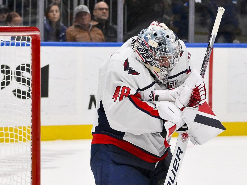 Nov 9, 2024; St. Louis, Missouri, USA;  Washington Capitals goaltender Logan Thompson (48) defends the net against the St. Louis Blues during the second period at Enterprise Center. Mandatory Credit: Jeff Curry-Imagn Images