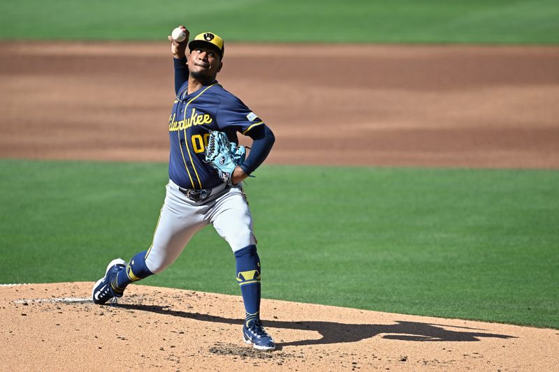 Jun 22, 2024; San Diego, California, USA; Milwaukee Brewers starting pitcher Carlos Rodriguez (00) pitches against the San Diego Padres during the first inning at Petco Park. Mandatory Credit: Orlando Ramirez-USA TODAY Sports