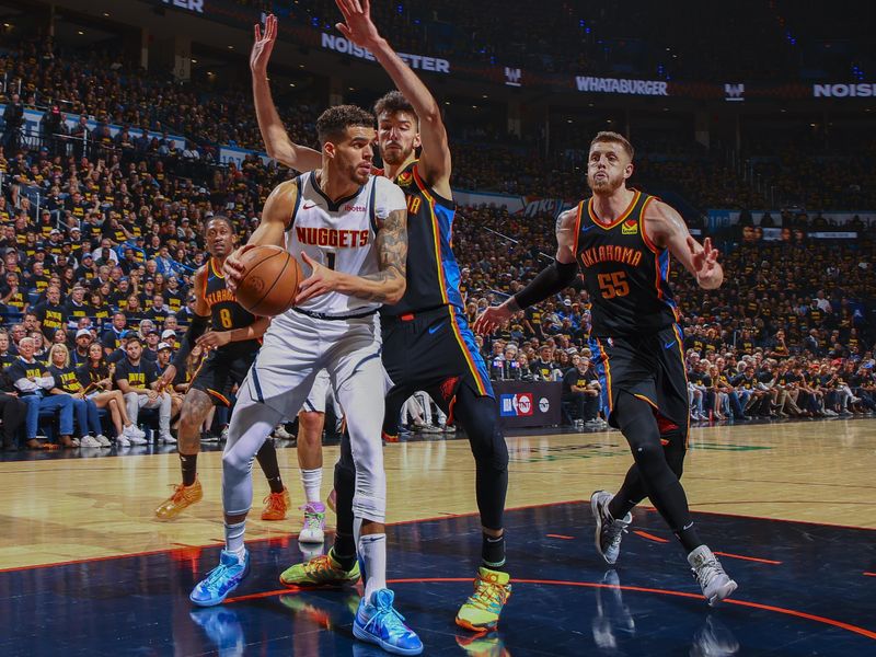 OKLAHOMA CITY, OK - MAY 7: Michael Porter Jr. #1 of the Denver Nuggets looks to pass the ball during Round 2, Game 2 of the 2025 NBA Playoffs against the Oklahoma City Thunder on May 7, 2025 at Paycom Center in Oklahoma City, Oklahoma. NOTE TO USER: User expressly acknowledges and agrees that, by downloading and or using this photograph, User is consenting to the terms and conditions of the Getty Images License Agreement. Mandatory Copyright Notice: Copyright 2024 NBAE (Photo by Zach Beeker/NBAE via Getty Images)