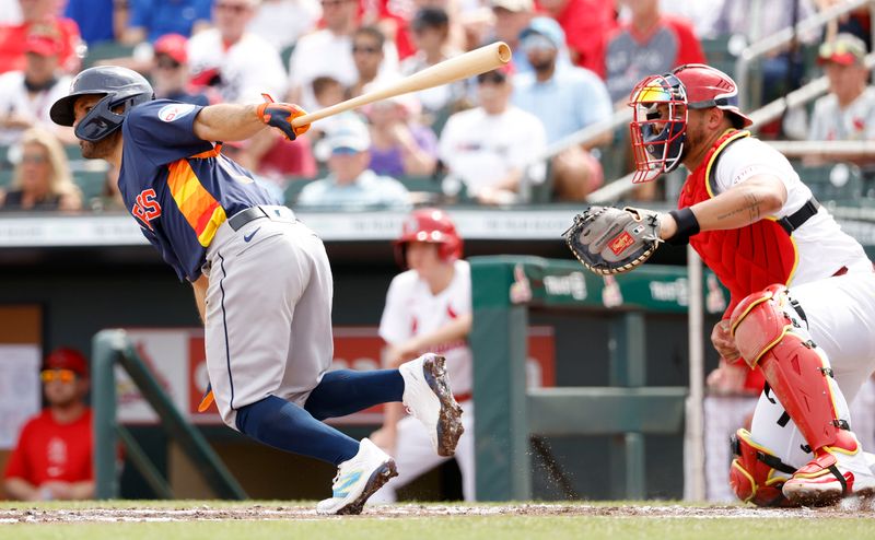 Mar 7, 2024; Jupiter, Florida, USA; Houston Astros second baseman Jose Altuve (27) bats against the St. Louis Cardinals in the second inning at Roger Dean Chevrolet Stadium. Mandatory Credit: Rhona Wise-USA TODAY Sports
