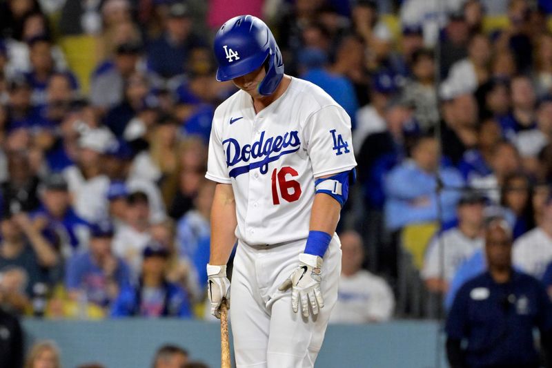 Oct 9, 2023; Los Angeles, California, USA; Los Angeles Dodgers catcher Will Smith (16) reacts after striking out against the Arizona Diamondbacks during the seventh inning for game two of the NLDS for the 2023 MLB playoffs at Dodger Stadium. Mandatory Credit: Jayne Kamin-Oncea-USA TODAY Sports