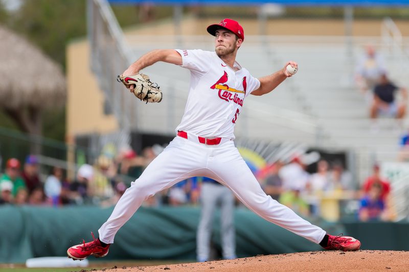 Mar 1, 2024; Jupiter, Florida, USA; St. Louis Cardinals starting pitcher Matthew Liberatore (52) delivers a pitch against the New York Mets during the second inning at Roger Dean Chevrolet Stadium. Mandatory Credit: Sam Navarro-USA TODAY Sports