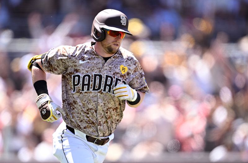 Apr 28, 2024; San Diego, California, USA; San Diego Padres first baseman Jake Cronenworth (9) rounds the bases after hitting a two-run home run against the Philadelphia Phillies during the third inning at Petco Park. Mandatory Credit: Orlando Ramirez-USA TODAY Sports