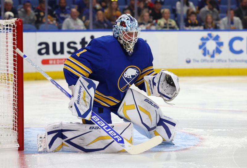 Oct 28, 2024; Buffalo, New York, USA;  Buffalo Sabres goaltender Ukko-Pekka Luukkonen (1) looks for the puck during the first period against the Florida Panthers at KeyBank Center. Mandatory Credit: Timothy T. Ludwig-Imagn Images