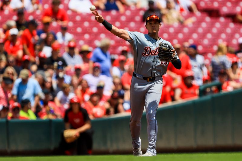 Jul 7, 2024; Cincinnati, Ohio, USA; Detroit Tigers third baseman Gio Urshela (13) throws to first to get Cincinnati Reds outfielder Spencer Steer (not pictured) out in the second inning at Great American Ball Park. Mandatory Credit: Katie Stratman-USA TODAY Sports