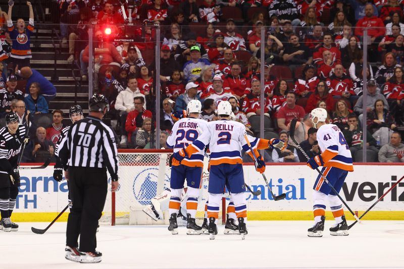 Apr 15, 2024; Newark, New Jersey, USA; New York Islanders center Brock Nelson (29) celebrates his goal against the New Jersey Devils during the second period at Prudential Center. Mandatory Credit: Ed Mulholland-USA TODAY Sports