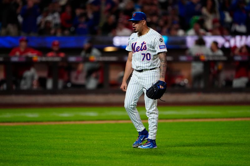 Sep 22, 2024; New York City, New York, USA;  New York Mets pitcher Jose Butto (70) reacts to getting the third out during the seventh inning against the Philadelphia Phillies at Citi Field. Mandatory Credit: Gregory Fisher-Imagn Images