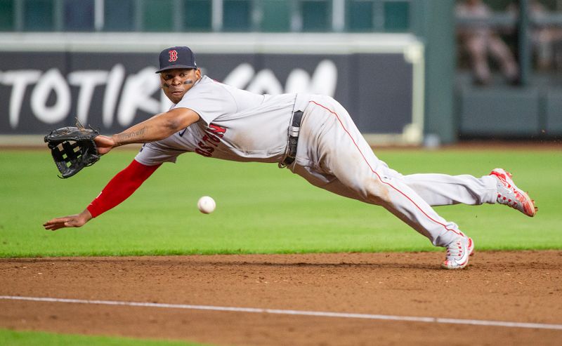 Aug 21, 2023; Houston, Texas, USA; Boston Red Sox third baseman Rafael Devers (11) can not handle Houston Astros third baseman Alex Bregman (2) (not pictured) stand up double line drive in the seventh inning at Minute Maid Park. Mandatory Credit: Thomas Shea-USA TODAY Sports