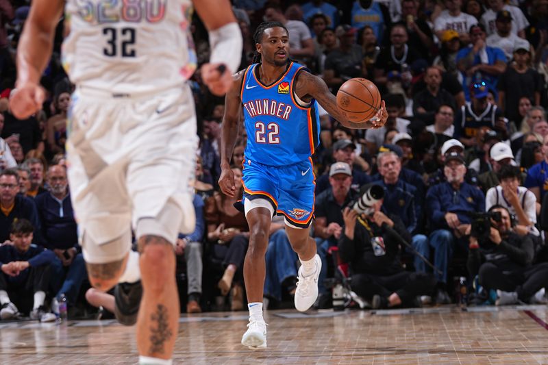 DENVER, CO - MAY 15: Cason Wallace #22 of the Oklahoma City Thunder handles the ball during the game against the Denver Nuggets during Round 2 Game 6 on May 15, 2025 at Ball Arena in Denver, Colorado. NOTE TO USER: User expressly acknowledges and agrees that, by downloading and/or using this Photograph, user is consenting to the terms and conditions of the Getty Images License Agreement. Mandatory Copyright Notice: Copyright 2025 NBAE (Photo by Bart Young/NBAE via Getty Images)