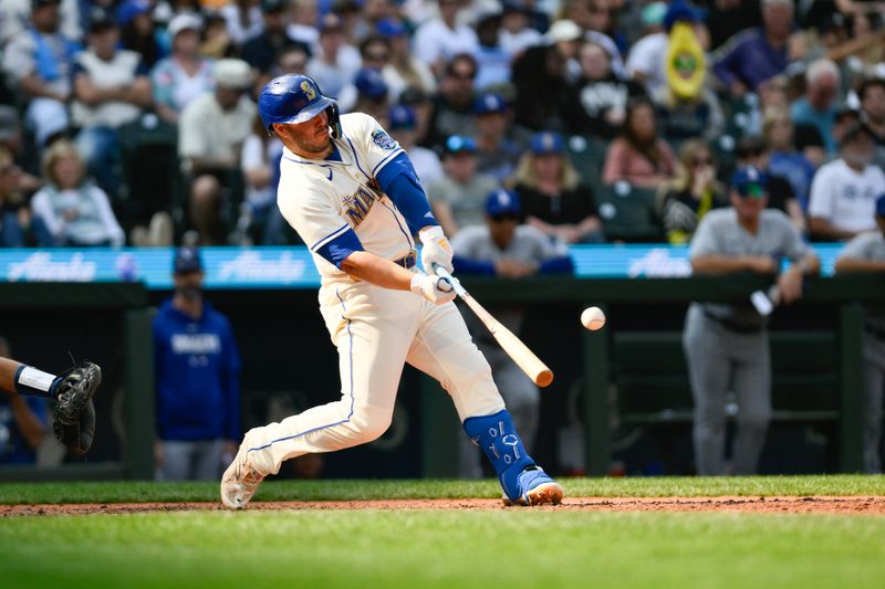 Sep 17, 2023; Seattle, Washington, USA; Seattle Mariners first baseman Ty France (23) hits a single against the Los Angeles Dodgers during the sixth inning at T-Mobile Park. Mandatory Credit: Steven Bisig-USA TODAY Sports