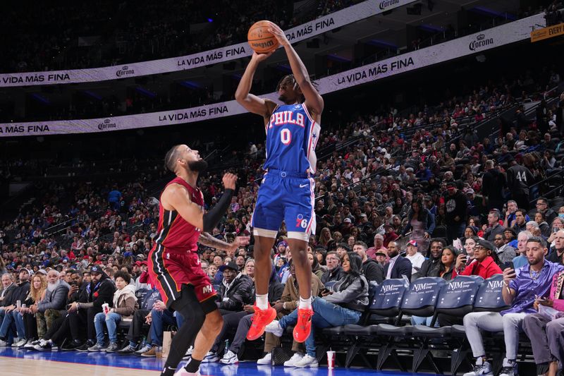 PHILADELPHIA, PA - FEBRUARY 14: Tyrese Maxey #0 of the Philadelphia 76ers shoots the ball during the game against the Miami Heat on February 14, 2024 at the Wells Fargo Center in Philadelphia, Pennsylvania NOTE TO USER: User expressly acknowledges and agrees that, by downloading and/or using this Photograph, user is consenting to the terms and conditions of the Getty Images License Agreement. Mandatory Copyright Notice: Copyright 2024 NBAE (Photo by Jesse D. Garrabrant/NBAE via Getty Images)