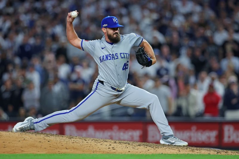 Oct 5, 2024; Bronx, New York, USA; Kansas City Royals pitcher John Schreiber (46) throws a pitch during the fifth inning against the New York Yankees during game one of the ALDS for the 2024 MLB Playoffs at Yankee Stadium. Mandatory Credit: Brad Penner-Imagn Images