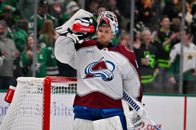 Nov 29, 2024; Dallas, Texas, USA; Colorado Avalanche goaltender Alexandar Georgiev (40) drinks water after he allows a goal to the Dallas Stars during the second period at the American Airlines Center. Mandatory Credit: Jerome Miron-Imagn Images