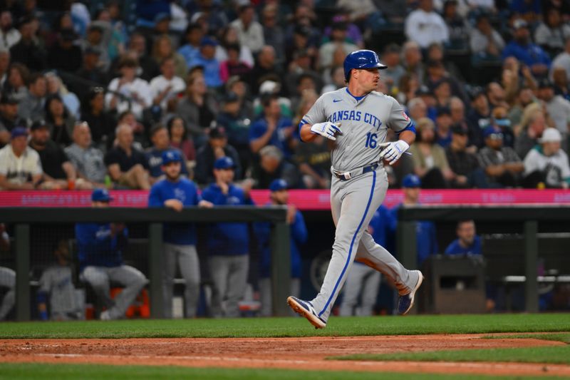 May 14, 2024; Seattle, Washington, USA; Kansas City Royals right fielder Hunter Renfroe (16) scores a run against the Seattle Mariners during the eighth inning at T-Mobile Park. Mandatory Credit: Steven Bisig-USA TODAY Sports