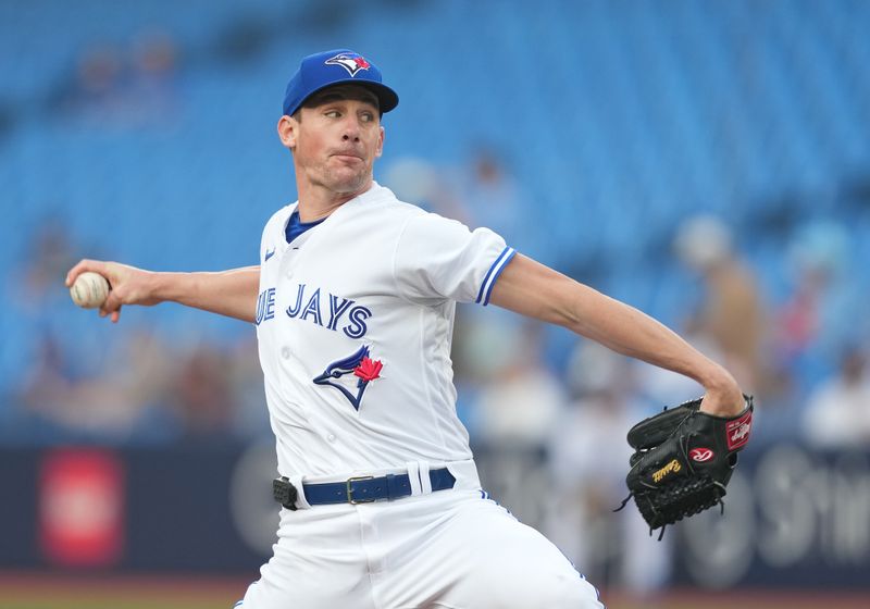 Jun 29, 2023; Toronto, Ontario, CAN; Toronto Blue Jays starting pitcher Chris Bassitt (40) throws a pitch against the San Francisco Giants during the first inning at Rogers Centre. Mandatory Credit: Nick Turchiaro-USA TODAY Sports