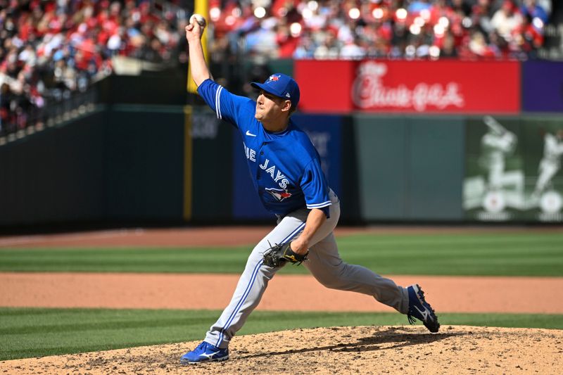 Apr 1, 2023; St. Louis, Missouri, USA; Toronto Blue Jays relief pitcher Erik Swanson (50) pitches against the St. Louis Cardinals in the eighth inning at Busch Stadium. Mandatory Credit: Joe Puetz-USA TODAY Sports