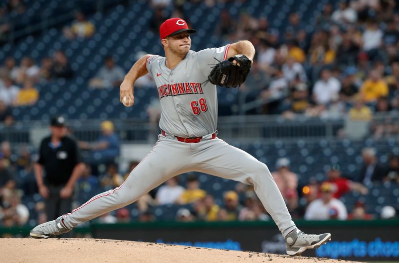 Jun 17, 2024; Pittsburgh, Pennsylvania, USA;  Cincinnati Reds starting pitcher Carson Spiers (68) delivers a pitch against the Pittsburgh Pirates during the first inning at PNC Park. Mandatory Credit: Charles LeClaire-USA TODAY Sports