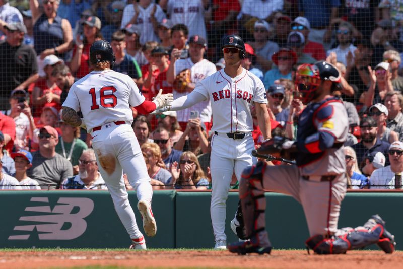 Jun 5, 2024; Boston, Massachusetts, USA; Boston Red Sox left fielder Jarren Duran (16) high fives Boston Red Sox designated hitter fielder Rob Refsnyder (30) after scoring during the fifth inning against the Atlanta Braves at Fenway Park. Mandatory Credit: Paul Rutherford-USA TODAY Sports