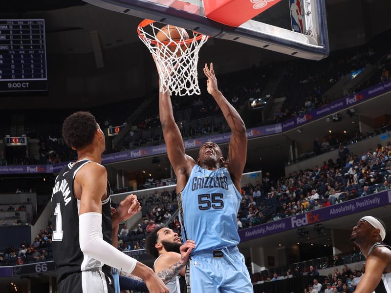 MEMPHIS, TN - APRIL 9: Trey Jemison #55 of the Memphis Grizzlies drives to the basket during the game against the San Antonio Spurs on April 9, 2024 at FedExForum in Memphis, Tennessee. NOTE TO USER: User expressly acknowledges and agrees that, by downloading and or using this photograph, User is consenting to the terms and conditions of the Getty Images License Agreement. Mandatory Copyright Notice: Copyright 2024 NBAE (Photo by Joe Murphy/NBAE via Getty Images)