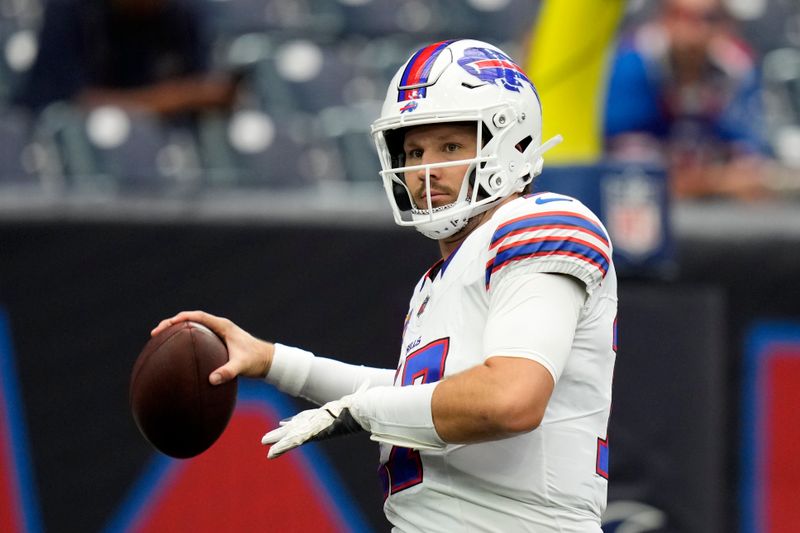 Buffalo Bills quarterback Josh Allen warms up before an NFL football game against the Houston Texans, Sunday, Oct. 6, 2024, in Houston. (AP Photo/Eric Gay)