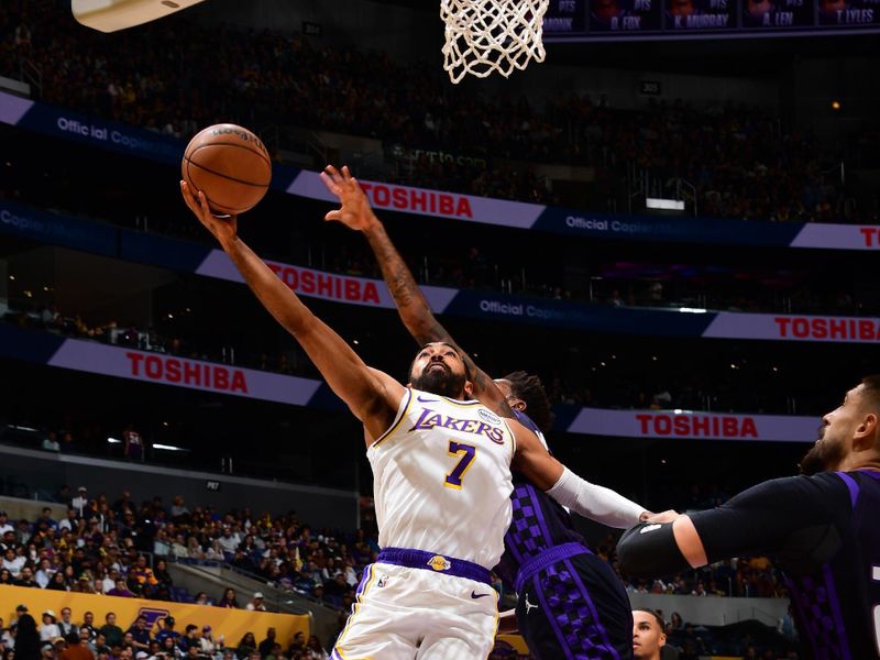 LOS ANGELES, CA - OCTOBER 26: Gabe Vincent #7 of the Los Angeles Lakers drives to the basket during the game against the Sacramento Kings on October 26, 2024 at Crypto.Com Arena in Los Angeles, California. NOTE TO USER: User expressly acknowledges and agrees that, by downloading and/or using this Photograph, user is consenting to the terms and conditions of the Getty Images License Agreement. Mandatory Copyright Notice: Copyright 2024 NBAE (Photo by Adam Pantozzi/NBAE via Getty Images)