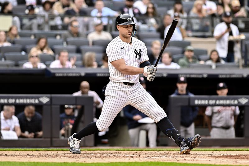 May 9, 2024; Bronx, New York, USA; New York Yankees designated hitter Giancarlo Stanton (27) reacts after striking out during the fourth inning against the Houston Astros at Yankee Stadium. Mandatory Credit: John Jones-USA TODAY Sports