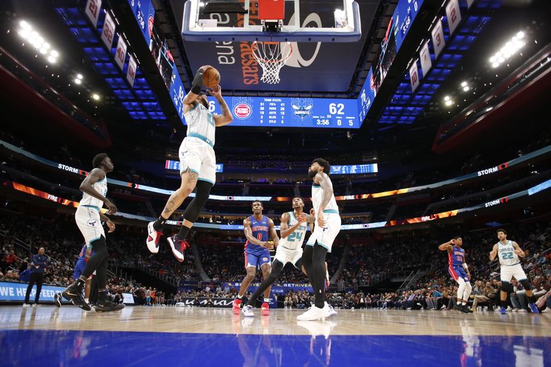 DETROIT, MI - March 11: Miles Bridges #0 of the Charlotte Hornets rebounds the ball during the game against the Detroit Pistons on March 11, 2024 at Little Caesars Arena in Detroit, Michigan. NOTE TO USER: User expressly acknowledges and agrees that, by downloading and/or using this photograph, User is consenting to the terms and conditions of the Getty Images License Agreement. Mandatory Copyright Notice: Copyright 2024 NBAE (Photo by Brian Sevald/NBAE via Getty Images)