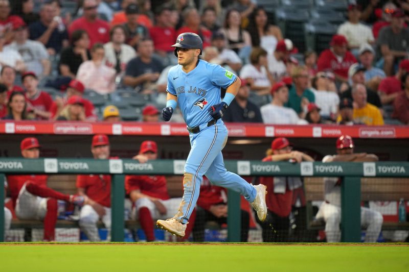 Aug 14, 2024; Anaheim, California, USA; Toronto Blue Jays left fielder Daulton Varsho (25) runs the bases after hitting a three-run home run in the fifth inning against the Los Angeles Angels at Angel Stadium. Mandatory Credit: Kirby Lee-USA TODAY Sports