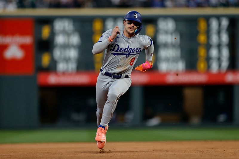 Jun 18, 2024; Denver, Colorado, USA; Los Angeles Dodgers third baseman Kike Hernandez (8) runs to third on an RBI in the seventh inning against the Colorado Rockies at Coors Field. Mandatory Credit: Isaiah J. Downing-USA TODAY Sports