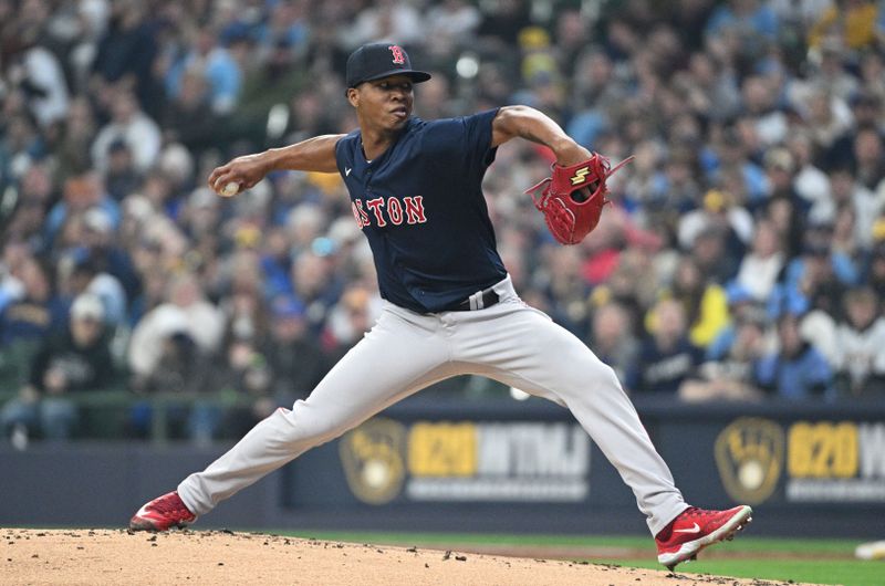 Apr 23, 2023; Milwaukee, Wisconsin, USA; Boston Red Sox starting pitcher Brayan Bello (66) delivers against the Milwaukee Brewers in the first inning at American Family Field. Mandatory Credit: Michael McLoone-USA TODAY Sports