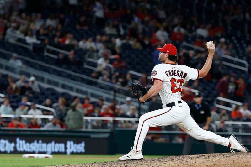 May 20, 2025; Washington, District of Columbia, USA; Washington Nationals closing pitcher Kyle Finnegan (67) pitches against the Atlanta Braves during the ninth inning at Nationals Park. Mandatory Credit: Geoff Burke-Imagn Images