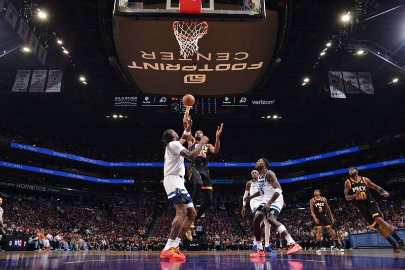 PHOENIX, AZ - APRIL 4: Kevin Durant #35 of the Phoenix Suns shoots the ball during the game against the Minnesota Timberwolves during Round 1 Game 4 of the 2024 NBA Playoffs on April 4, 2023 at Footprint Center in Phoenix, Arizona. NOTE TO USER: User expressly acknowledges and agrees that, by downloading and or using this photograph, user is consenting to the terms and conditions of the Getty Images License Agreement. Mandatory Copyright Notice: Copyright 2024 NBAE (Photo by Barry Gossage/NBAE via Getty Images)