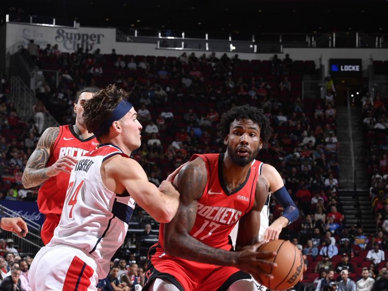 HOUSTON, TX - NOVEMBER 11: Tari Eason #17 of the Houston Rockets drives to the basket during the game against the Washington Wizards on November 11, 2024 at the Toyota Center in Houston, Texas. NOTE TO USER: User expressly acknowledges and agrees that, by downloading and or using this photograph, User is consenting to the terms and conditions of the Getty Images License Agreement. Mandatory Copyright Notice: Copyright 2024 NBAE (Photo by Logan Riely/NBAE via Getty Images)