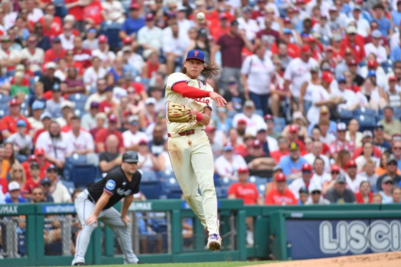 Jun 30, 2024; Philadelphia, Pennsylvania, USA; Philadelphia Phillies third base Alec Bohm (28) throws to first base against the Miami Marlins during the first inning at Citizens Bank Park. Mandatory Credit: Eric Hartline-USA TODAY Sports