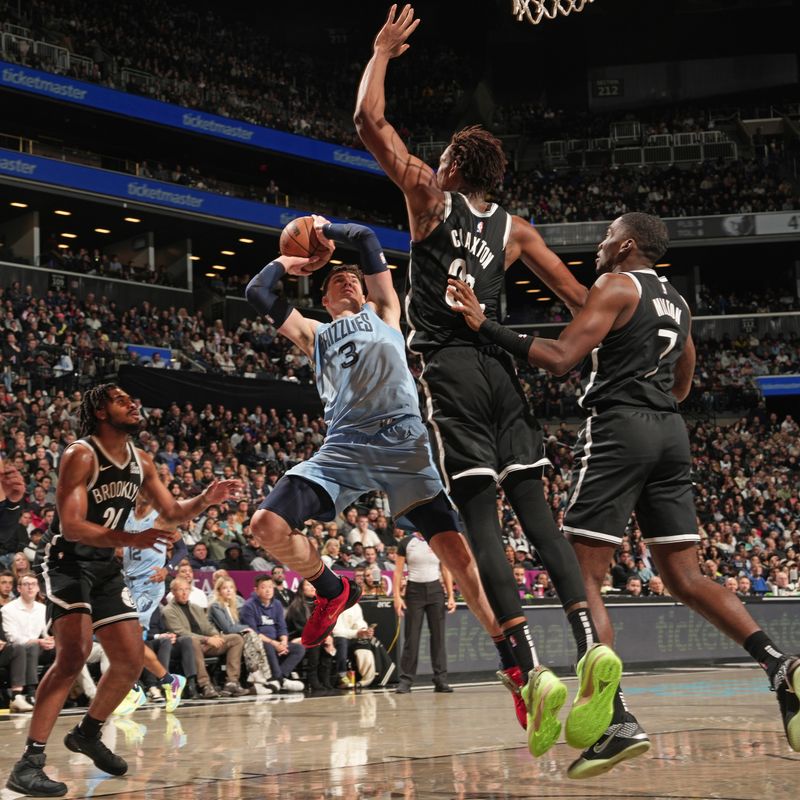 BROOKLYN, NY - NOVEMBER 4: Jake LaRavia #3 of the Memphis Grizzlies shoots the ball during the game against the Brooklyn Nets on November 4, 2024 at Barclays Center in Brooklyn, New York. NOTE TO USER: User expressly acknowledges and agrees that, by downloading and or using this Photograph, user is consenting to the terms and conditions of the Getty Images License Agreement. Mandatory Copyright Notice: Copyright 2024 NBAE (Photo by Jesse D. Garrabrant/NBAE via Getty Images)