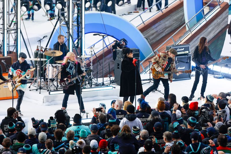 Jan 1, 2024; Seattle, Washington, USA; Heart performs during the first intermission in the 2024 Winter Classic ice hockey game between the Vegas Golden Knights and Seattle Kraken at T-Mobile Park. Mandatory Credit: Joe Nicholson-USA TODAY Sports