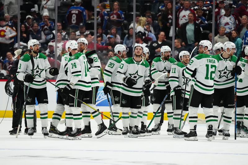 May 17, 2024; Denver, Colorado, USA; Members of the Dallas Stars following a double overtime period win against the Colorado Avalanche in game six of the second round of the 2024 Stanley Cup Playoffs at Ball Arena. Mandatory Credit: Ron Chenoy-USA TODAY Sports