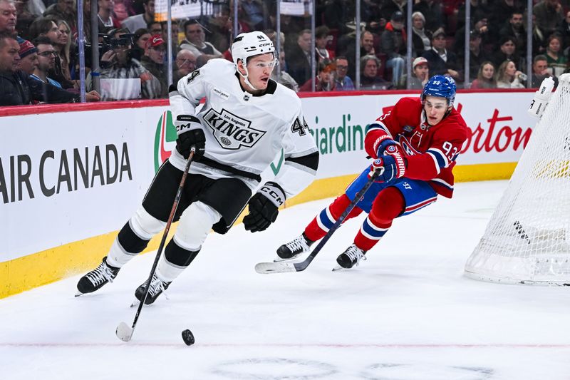 Nov 11, 2025; Montreal, Quebec, CAN; Los Angeles Kings defenseman Mikey Anderson (44) defends the puck against Montreal Canadiens right wing Ivan Demidov (93) during the first period at Bell Centre. Mandatory Credit: David Kirouac-Imagn Images
