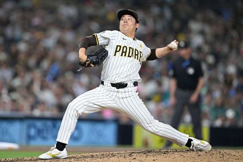 Jun 9, 2024; San Diego, California, USA; San Diego Padres relief pitcher Yuki Matsui (1) pitches during the seventh inning against the Seattle Mariners at Petco Park. Mandatory Credit: Denis Poroy-USA TODAY Sports at Petco Park. 