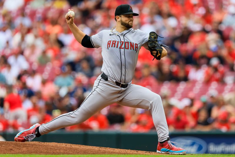 May 9, 2024; Cincinnati, Ohio, USA; Arizona Diamondbacks starting pitcher Slade Cecconi (43) pitches against the Cincinnati Reds in the first inning at Great American Ball Park. Mandatory Credit: Katie Stratman-USA TODAY Sports